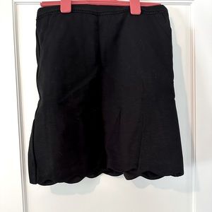 Black stretchy pencil skirt with scalloped edge